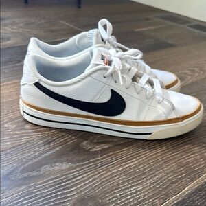 Nike women’s White and Black Sneakers